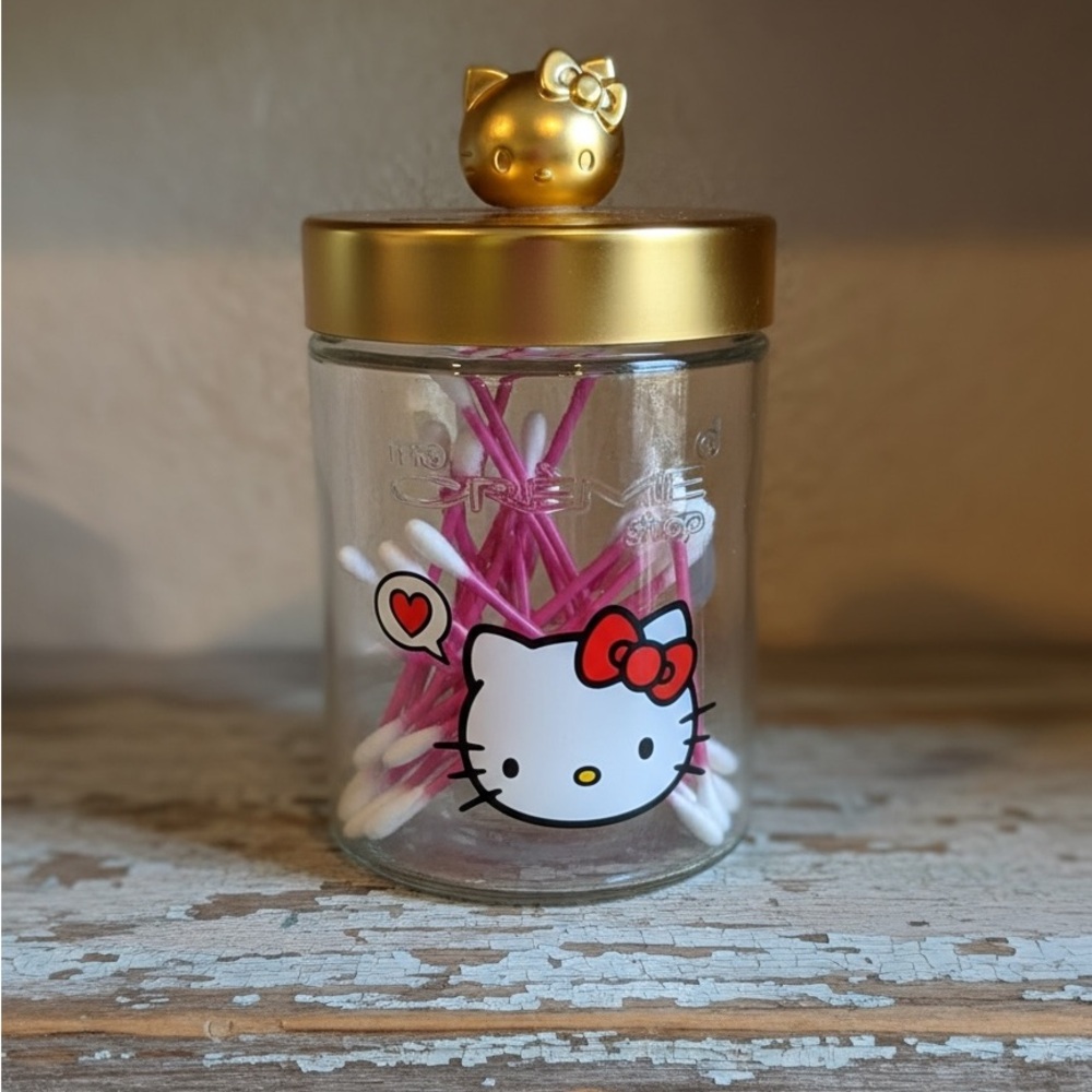 The Crème Shop x Hello Kitty Reusable Clear Glass Jar with Gold Lid 
NWT